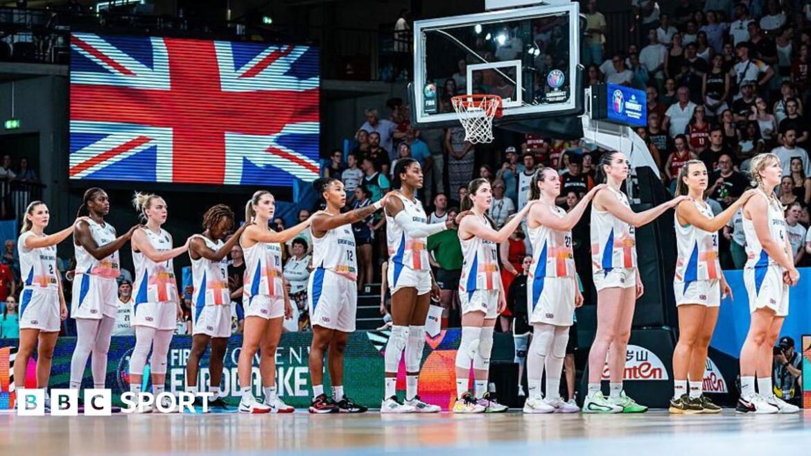Great Britain players line up for the national anthem before a match against in Hamburg