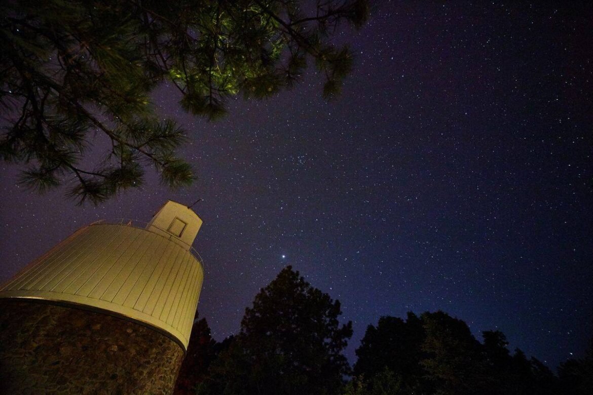 Lowell Observatory under a vibrant starlit sky in Sedona, Arizona