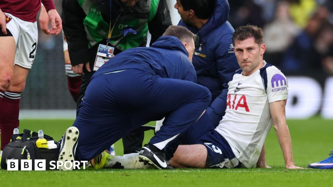 Ben Davies of Tottenham Hotspur reacts before leaving the game injured during the Premier League match between Tottenham Hotspur and West Ham United at Tottenham Hotspur Stadium on January 17, 2026 