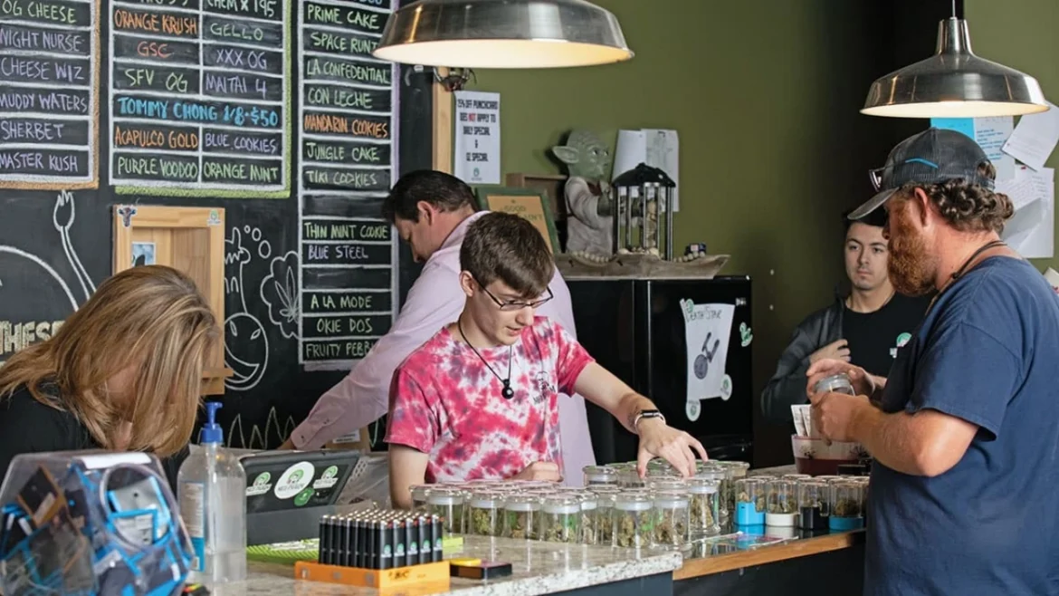 Image of budtenders helping customers