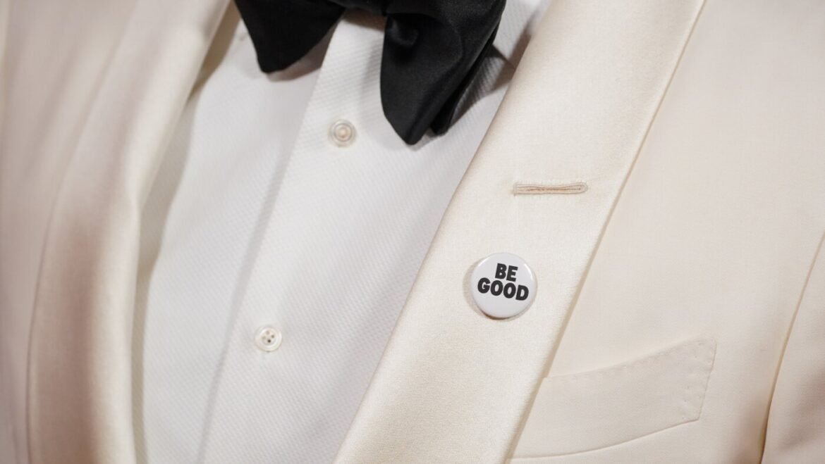 Celebrities wear pins protesting ICE at the Golden Globes : NPR