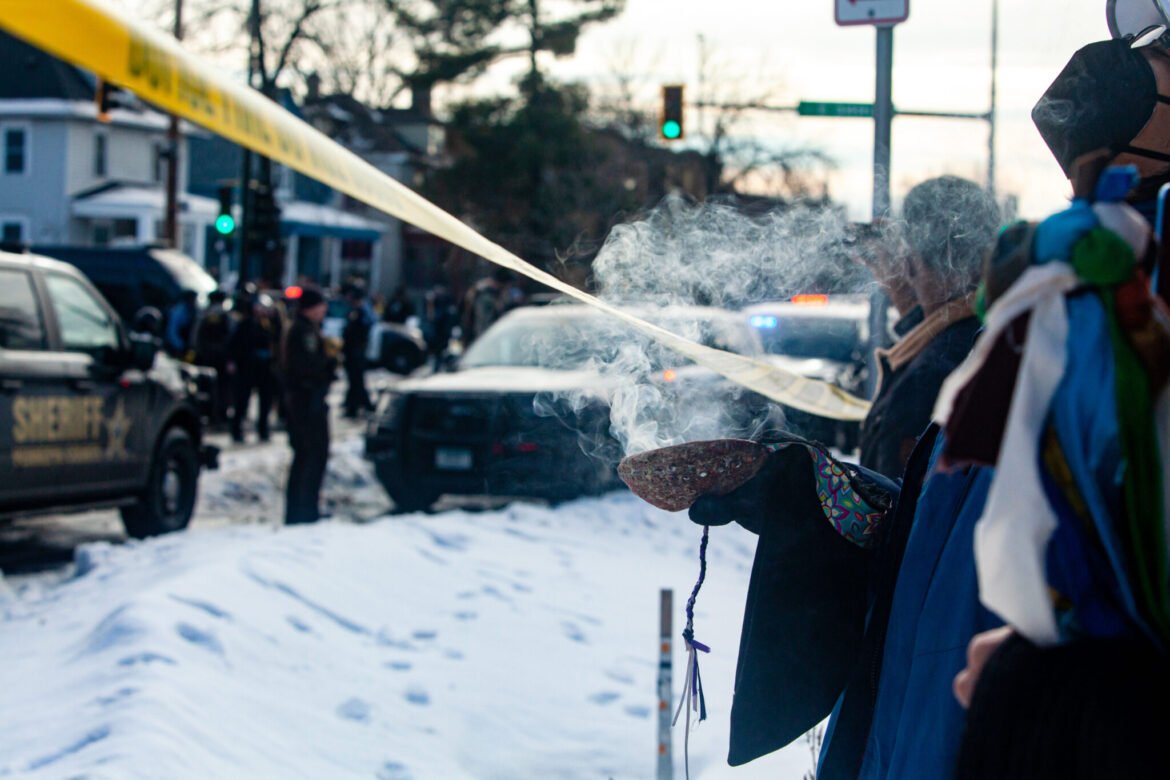 People gather around the south Minneapolis site where a U.S. Immigration and Customs Enforcement officer fatally shot a woman on Wednesday, Jan. 7, 2026. (Photo by Nicole Neri/Minnesota Reformer)