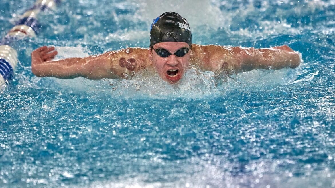 Kiss breaks two meet records as No. 20 Passaic Tech wins 11th straight county title
