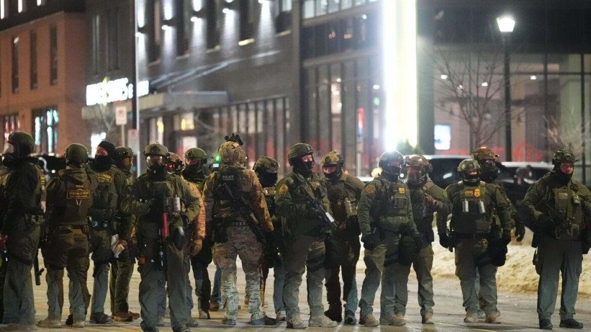 Minnesota sues and residents protest Trump's immigration surge as Tom Homan tapped : NPR