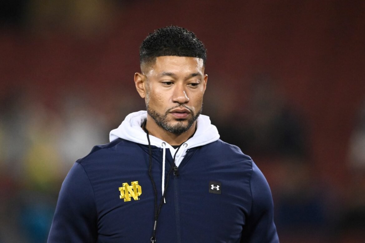 Head coach Marcus Freeman of the Notre Dame Fighting Irish looks on during warm ups before the game against the Stanford Cardinal at Stanford Stadium on November 29, 2025 in Stanford, California.