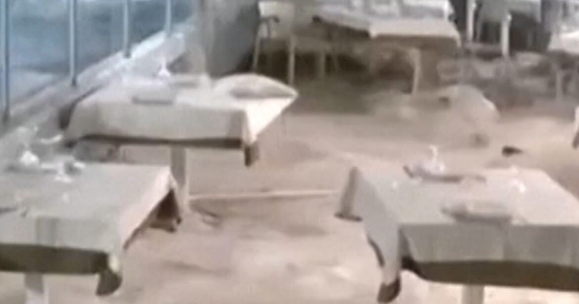 Video shows storm surge flood restaurant in Sicily