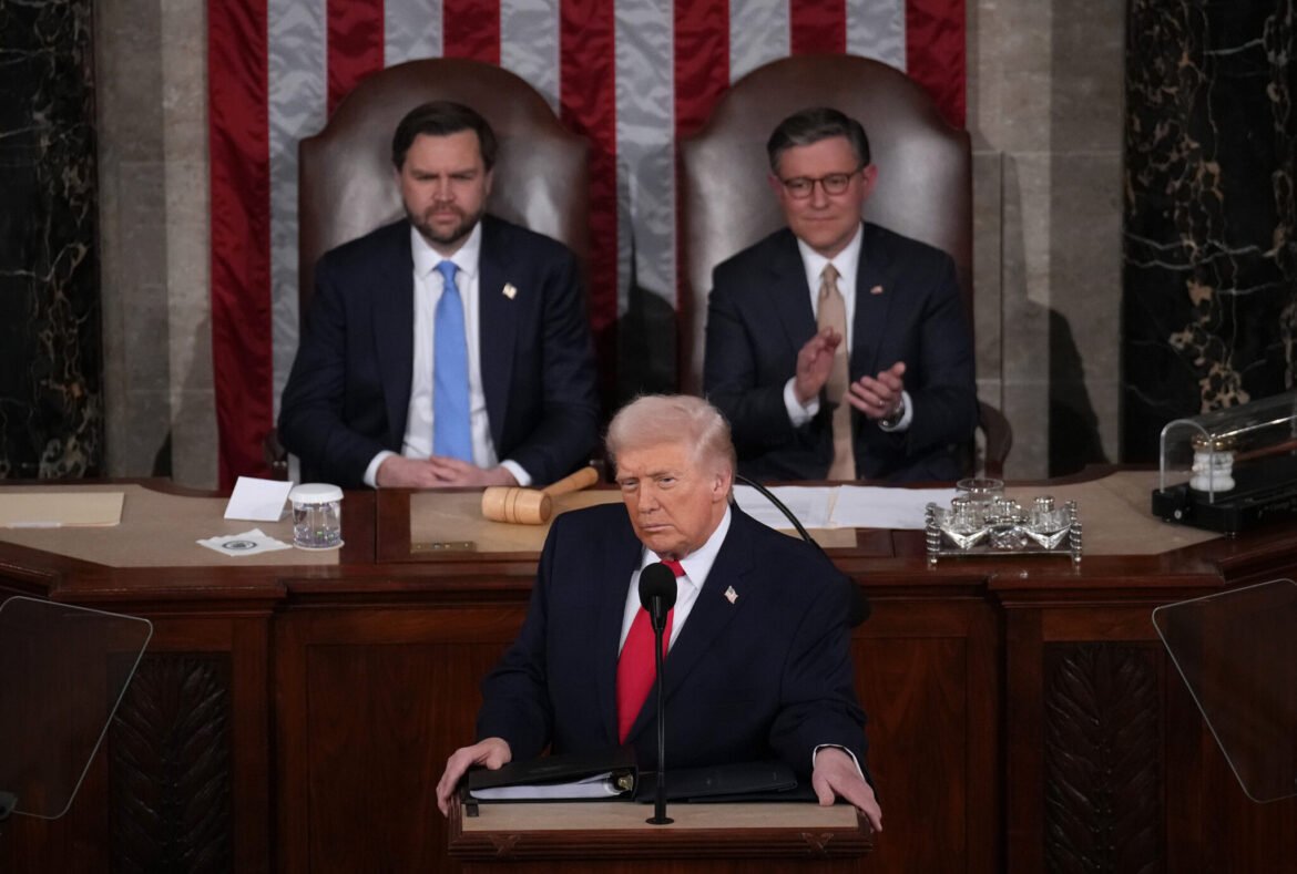 U.S. President Donald Trump, with Vice President JD Vance and Speaker of the House Mike Johnson, R-La., looking on, delivers his State of the Union address during a Joint Session of Congress at the U.S. Capitol on Feb. 24, 2026, in Washington, D.C. (Photo by Andrew Harnik/Getty Images)