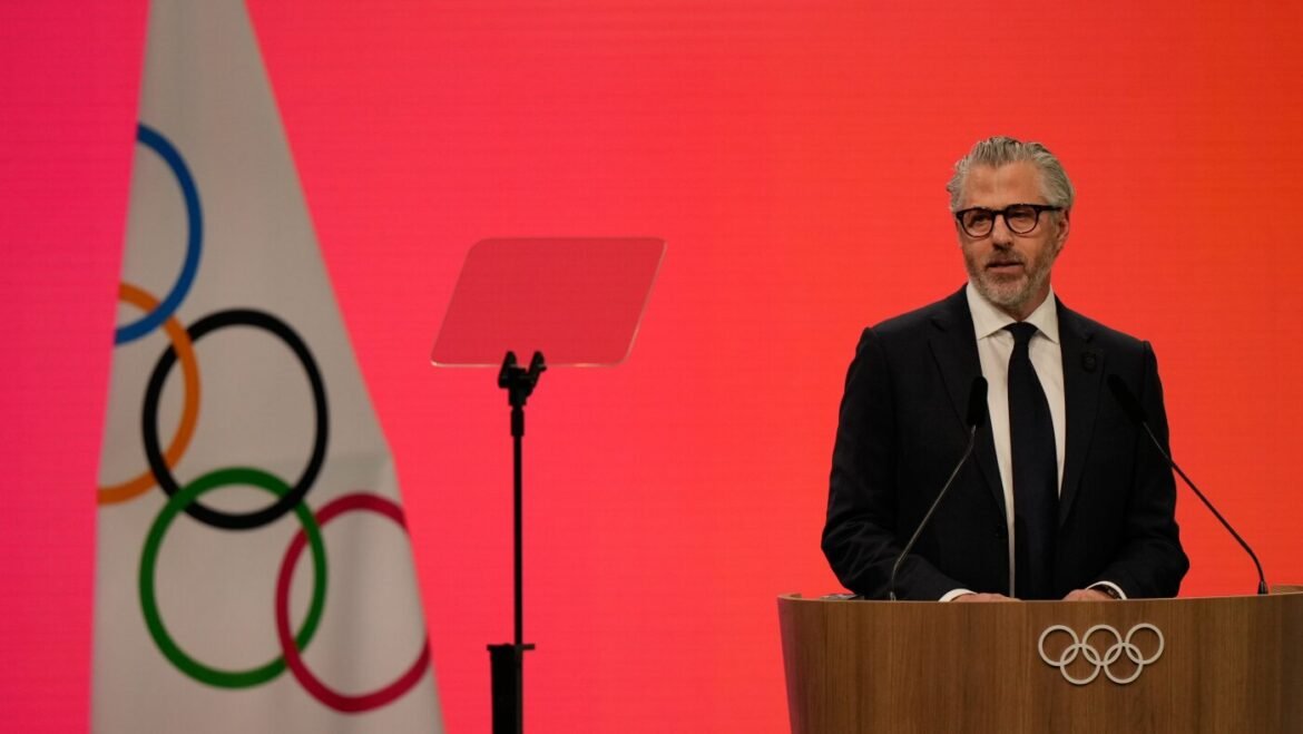 Behind the glitz in Milan, the Epstein scandal casts its shadow over the Olympic movement : NPR