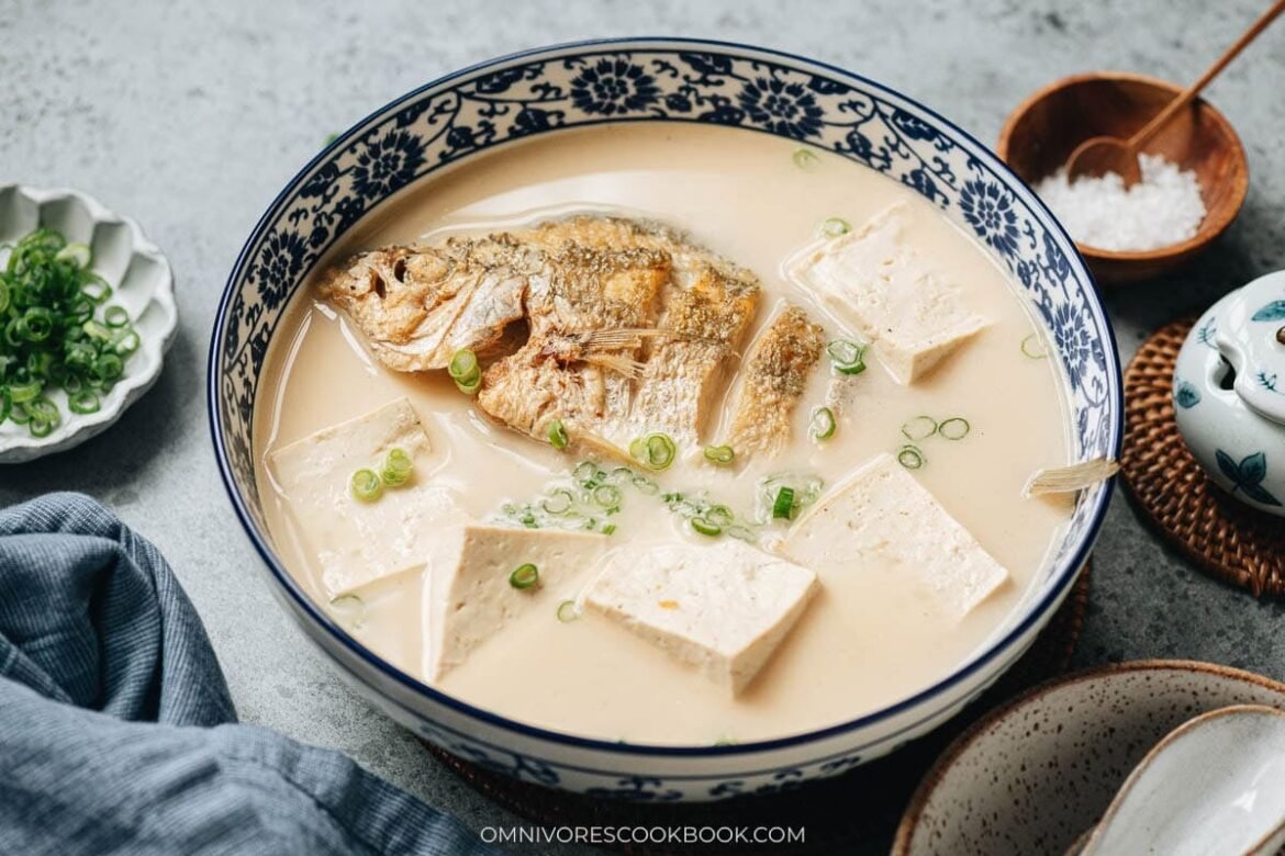 Close up of milky fish soup with tofu