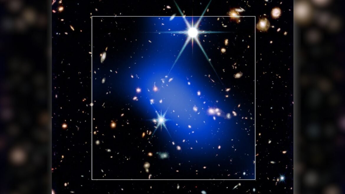A bright blue streak of light is seen covering a series of bright stars in this dark deep space image. A white box surrounds the blue shape