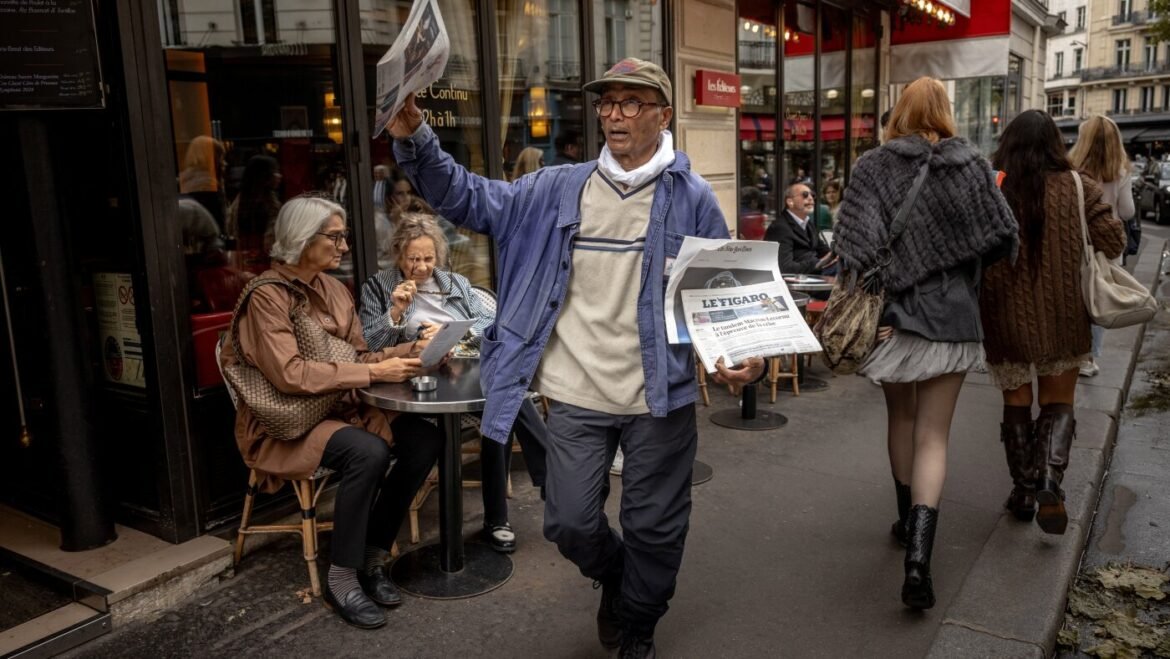 France honors last newspaper hawker in Paris with knighthood : NPR