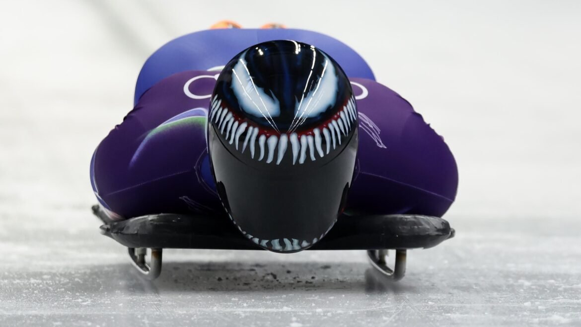 USA's Austin Florian Wears Custom 'Venom' Helmet in Photo from Skeleton Race at 2026 Winter Olympics