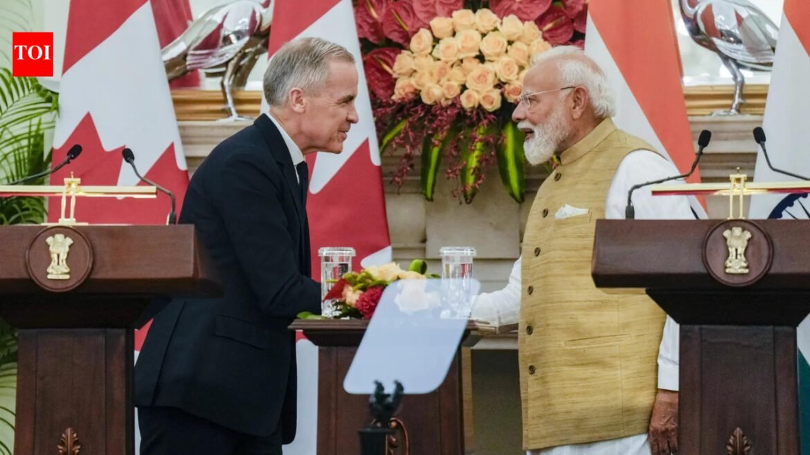 After thaw, bonhomie: Carney, Modi sign $2.6bn...