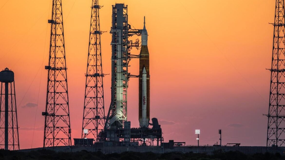 The sunrise casts a warm glow around the Artemis I Space Launch System (SLS) and Orion spacecraft at Launch Pad 39B at NASA&rsquo;s Kennedy Space Center in Florida on March 21.