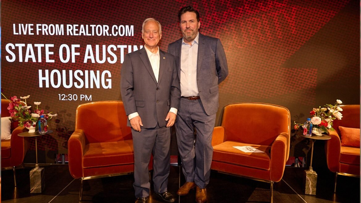 Austin Mayor stands next to Realtor.com CEO Damian Eales at SXSW 2026