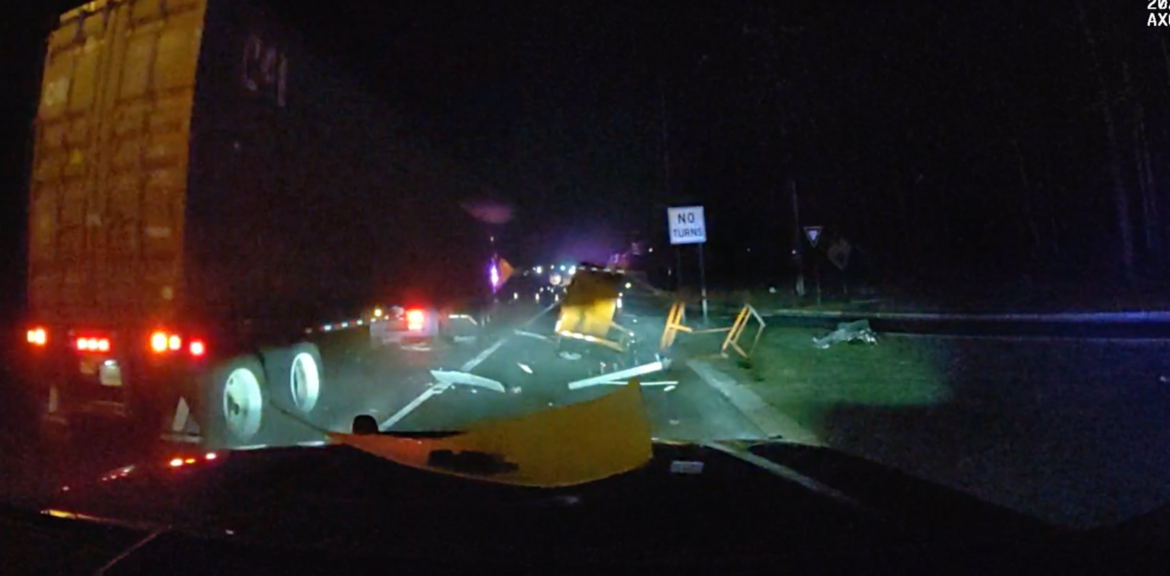 Distracted tractor-trailer driver sideswipes police car on N.J. highway. Watch the scary video