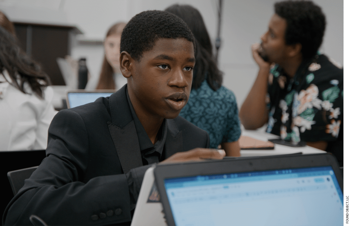 The Washington Urban Debate League, a team of competitive high school debaters, is the subject of the new documentary Immutable, which will be distributed by PBS on March 6. WUDL member Saadiq is shown preparing for a debate with his teammates in a moment from the film.