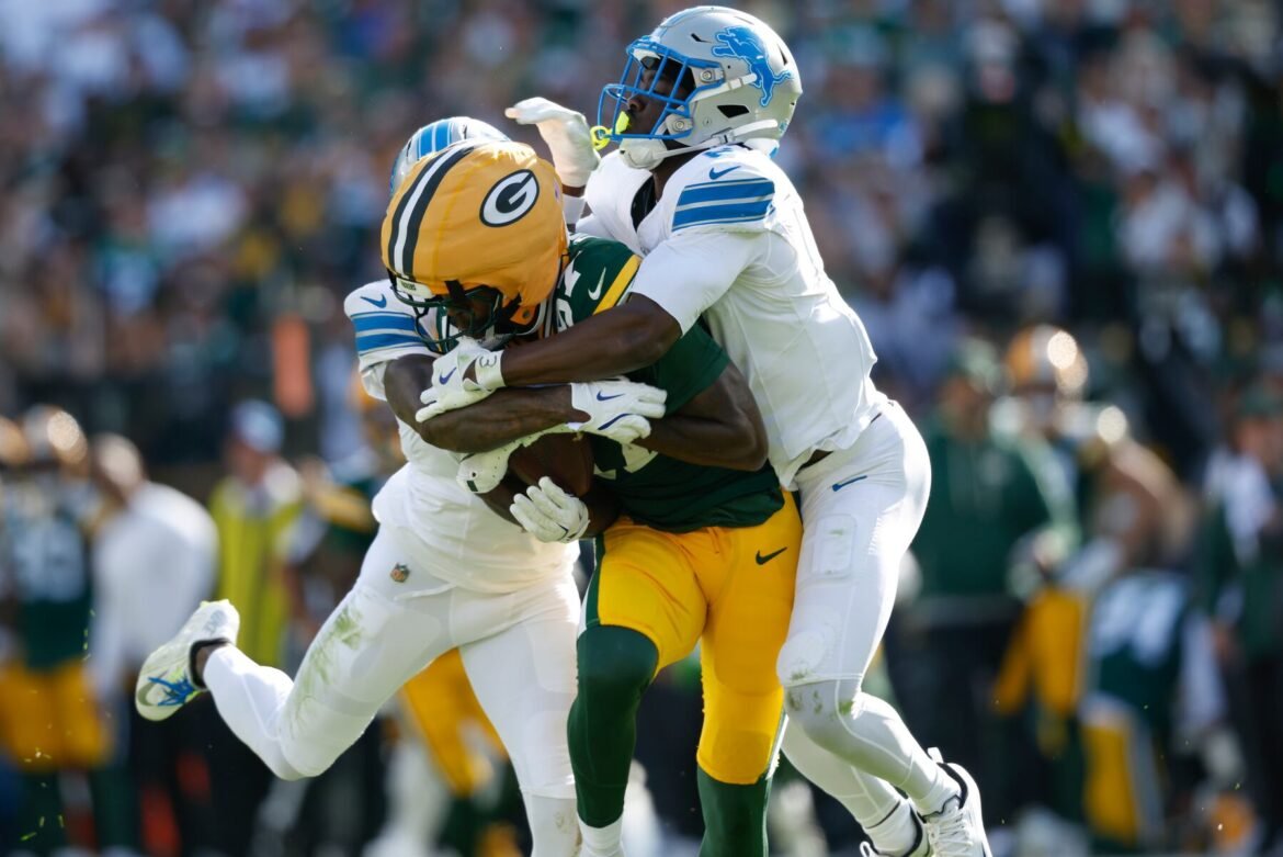 Green Bay Packers wide receiver Romeo Doubs (87) catches a long pass against the Detroit Lions during a NFL football game, Sunday, Sept. 7, 2025, in Green Bay, Wis. (AP Photo/Jeffrey Phelps