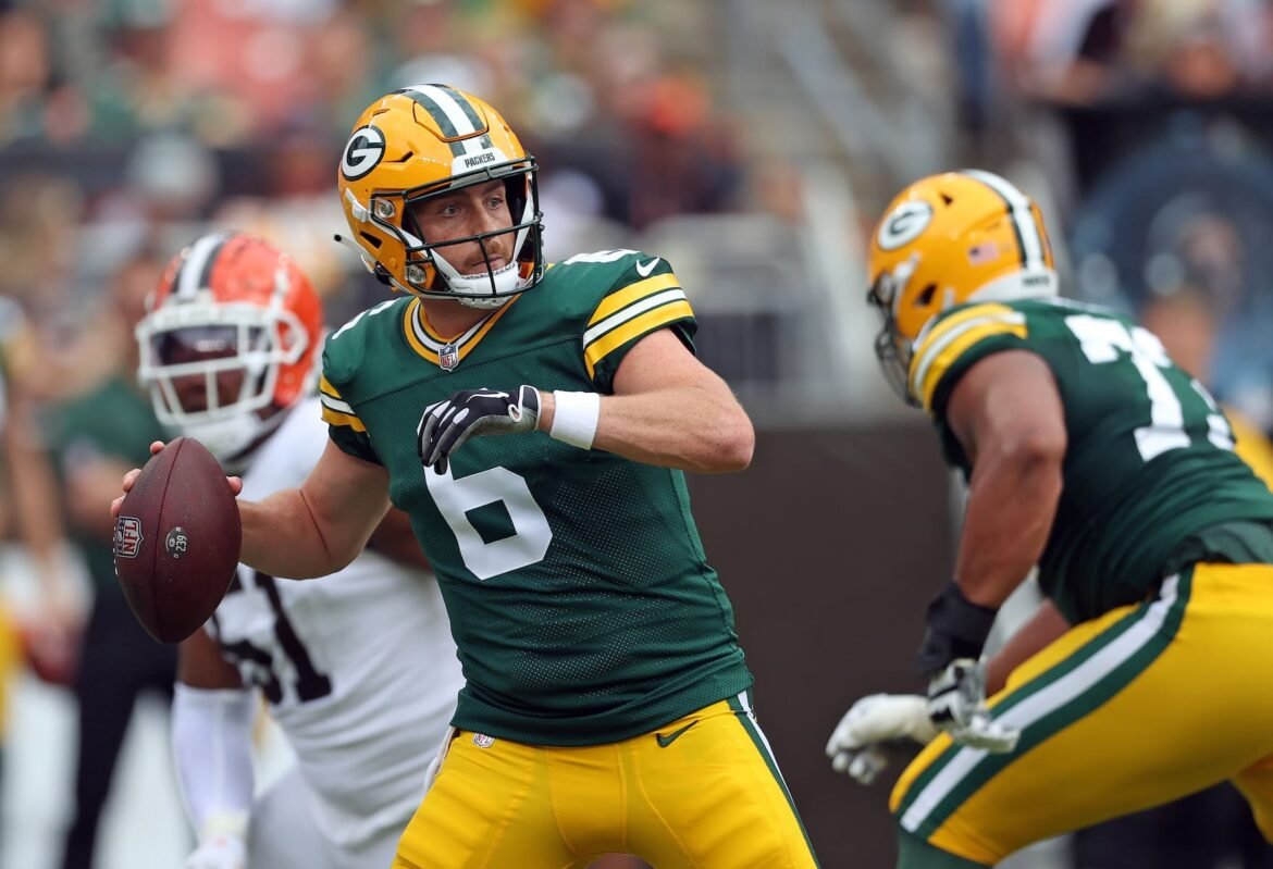 Green Bay Packers quarterback Sean Clifford looks to pass against the Cleveland Browns in the first half of play. 