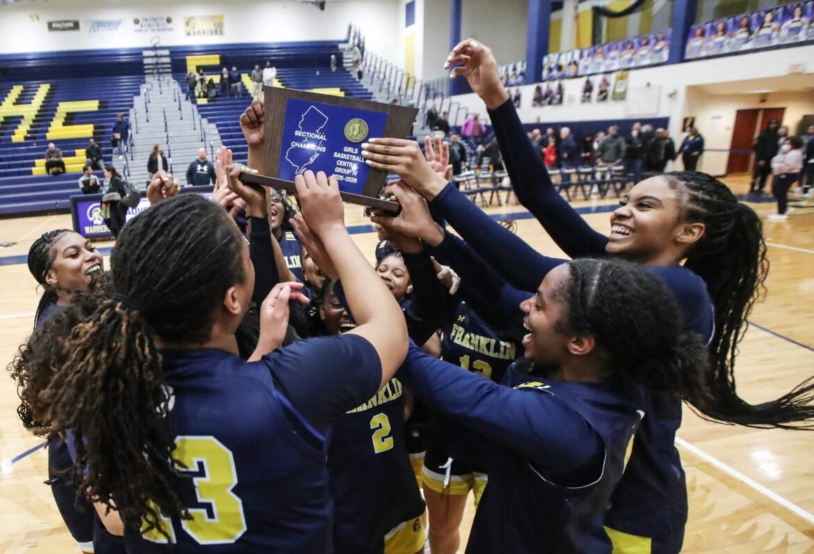 Franklin celebrates with the trophy after winning the NJSIAA Central Jersey, Group 4 girls basketball sectional final between Franklin and Hillsborough at Franklin High School in Somerset, NJ on 3/5/26.