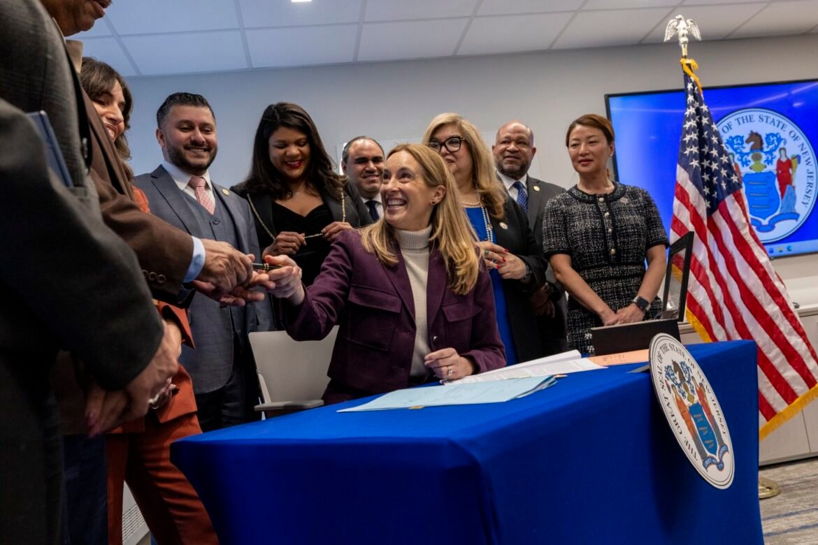 Gov. Sherrill signs bills limiting state role in immigration enforcement • New Jersey Monitor