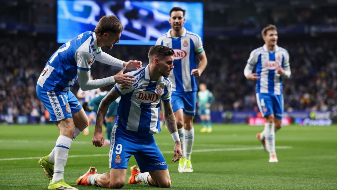 Espanyol's Roberto Fernandez celebrates scoring his team's first goal against Alaves with Jofre Carreras
