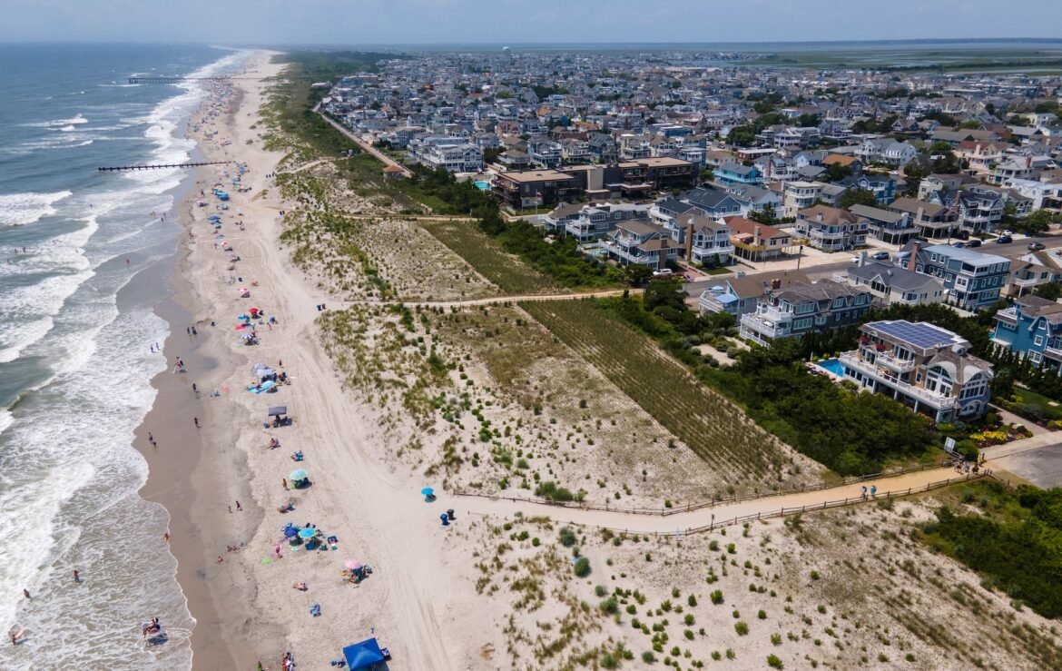 The beach, ocean and skyline are in Avalon, New Jersey, on Monday, July 18, 2022. (AP Photo/Ted Shaffrey)