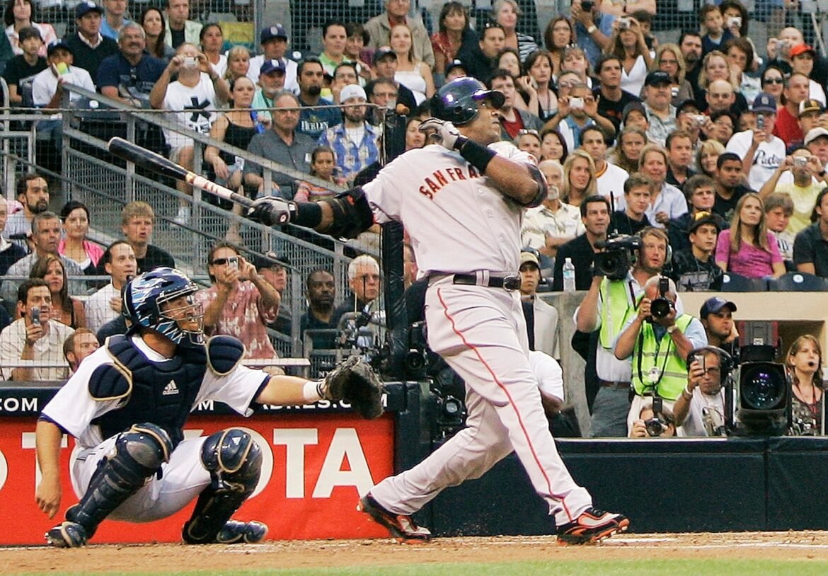 FILE - San Francisco Giants' Barry Bonds watches the flight of his home run, his 755th, during the second inning of a baseball game game against the San Diego Padres in San Diego, Saturday, Aug. 4, 2007.  (AP Photo/ Kevork Djansezian, File)