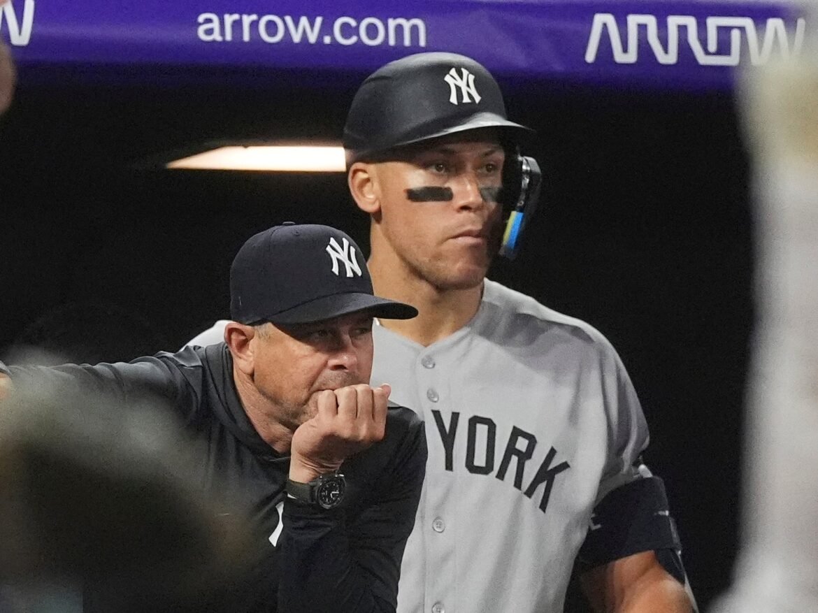 The Yankees are beginning season 17 of their current championship drought, heightening the focus on their manager and captain. 