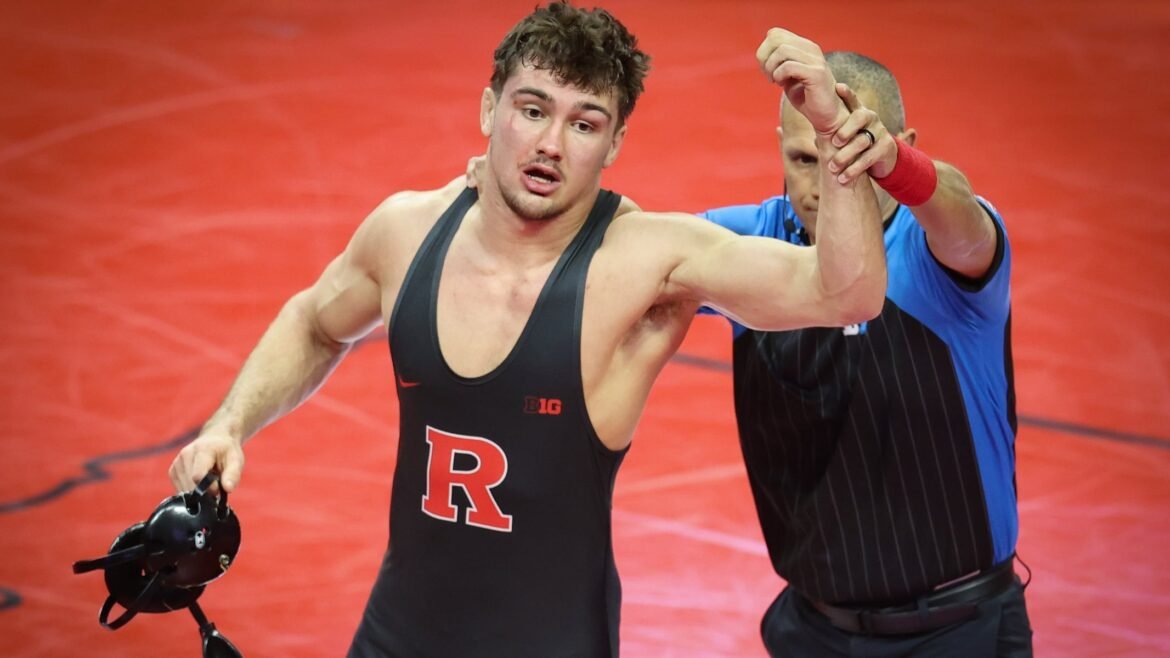 Remy Cotton of Rutgers (top) won a 4-1 decision over Hayden Walters in the 197-pound bout of a Big Ten wrestling dual meet, Friday, Jan. 16, 2026 in Piscataway, N.J. 