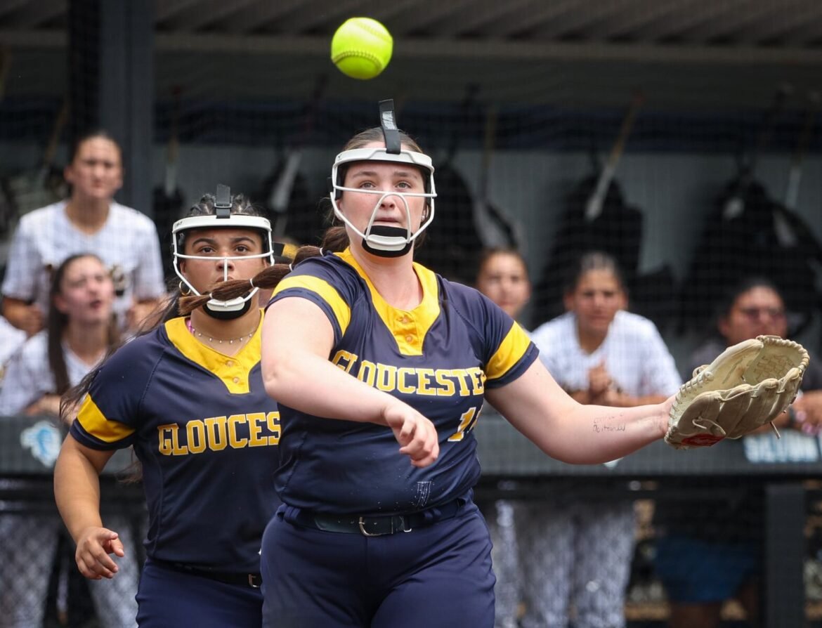 Gloucester pitcher Emma Dick (11) makes a throw to first in the top of the 7th inning against Hanover Park in the 2025 NJSIAA Group 2 softball final, Friday, June 13, 2025, in Newark, N.J. Gloucester won, 3-2.