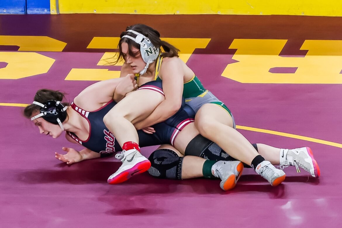 Stella Frigiola of North Hunterdon wrestles Ava Forstenhausler of Roselle Park during the 152 opening round of the NJSIAA Wrestling State Championship at Boardwalk Hall in Atlantic City, New Jersey on Thursday March 10, 2026.