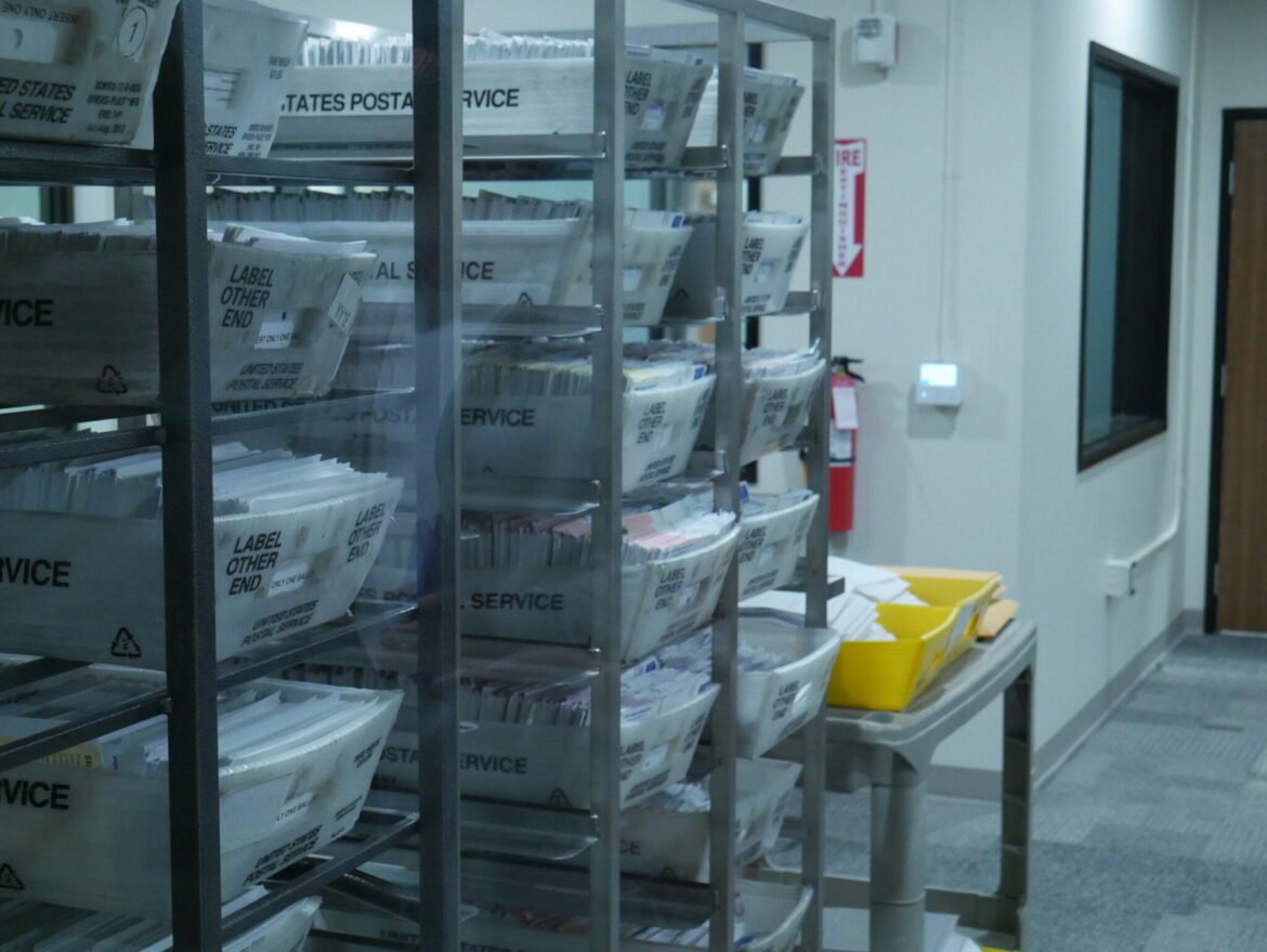 Baskets of ballots sit at a new ballot processing center in Thurston County, Washington, on Oct. 30, 2025. (Photo by Jake Goldstein-Street/Washington State Standard)