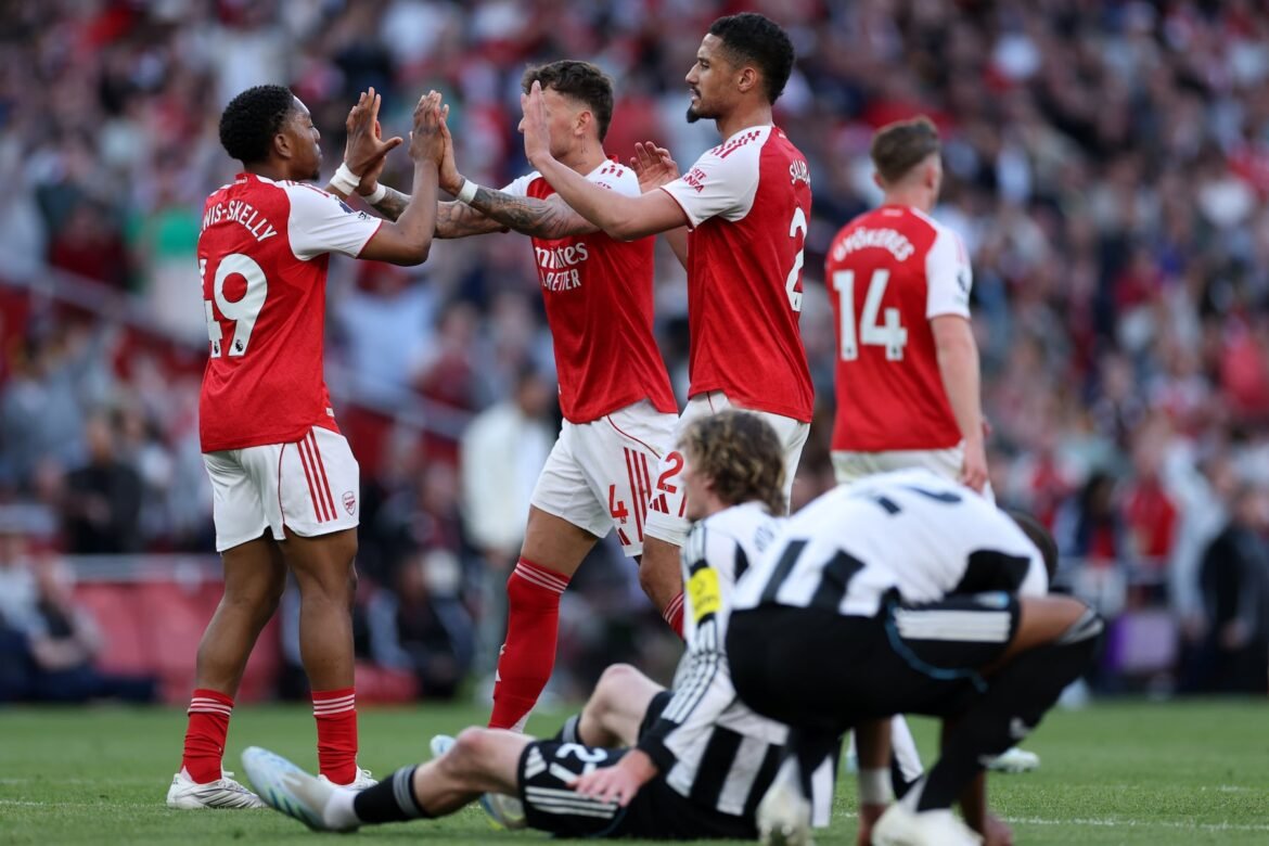 Arsenal players celebrate at the end the English Premier League soccer match between Arsenal and Newcastle United in London, Saturday, April 25, 2026. (AP Photo/Ian Walton)