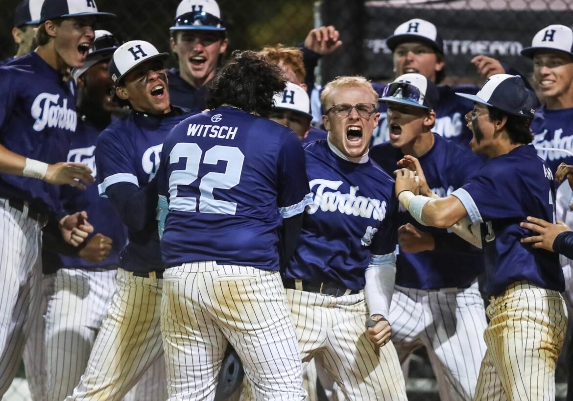 Highland celebrates the go-ahead two-run home run by Nick Witsch (22) in the top of the seventh inning during the Downbeach Coaches Vs. Cancer baseball game between Hammonton and Highland at Jerome Avenue Fields in Margate City, NJ on 4/23/26.