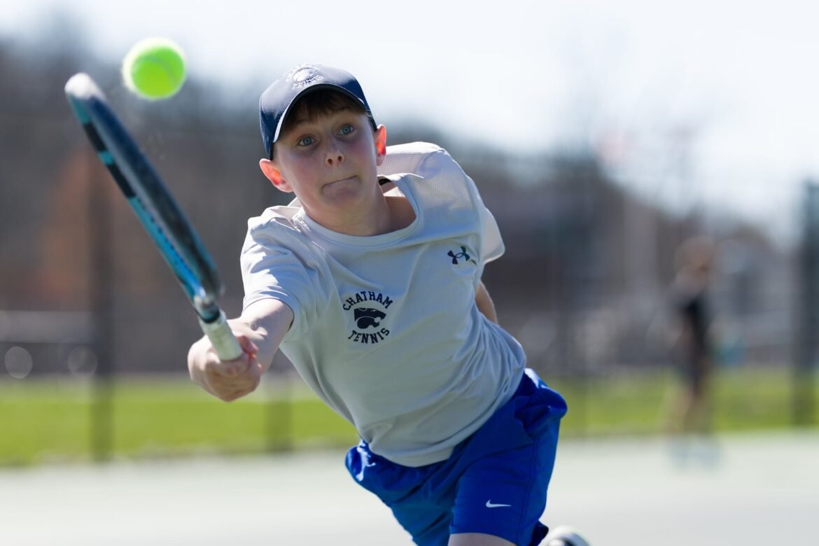 Elias Bruu-Syversen of Chatham reaches to return a volley in 3rs singles against Pingry in the Bryan Bennett Memorial high school boys tennis tournament quarterfinals on Saturday in Morristown. 04/11/2026
