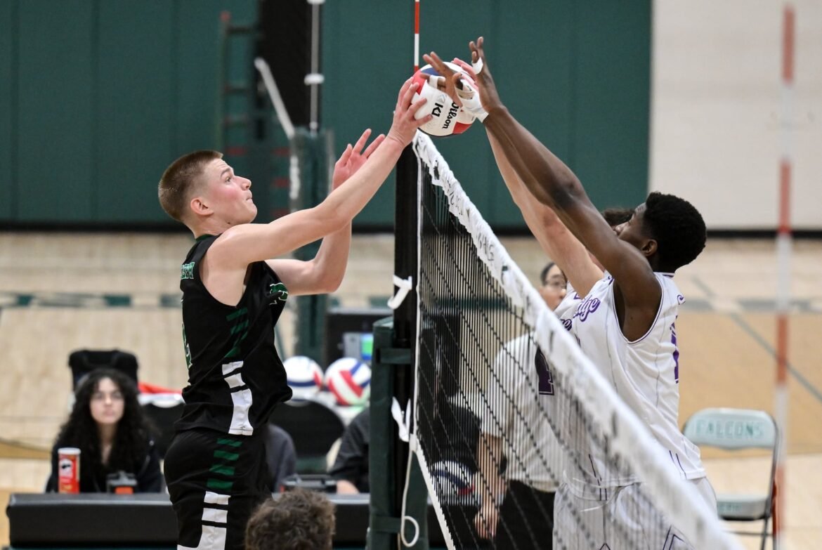 Dominic Nycz (2) of St. Joseph (Metuchen) hits the ball against Akin Oyebode (17) of Old Bridge (10) during the boys volleyball match between St. Joseph (Metuchen) and Old Bridge at St. Joseph High School in Metuchen, NJ on Tuesday. April 14, 2026