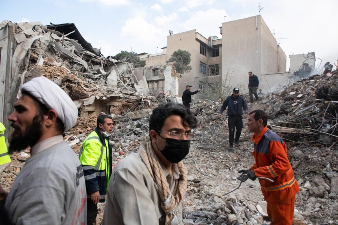 Emergency crews work at the site of a US-Israeli strike on a residential building that also destroyed the adjacent Rafi-Nia Synagogue on April 7, 2026, in Tehran, Iran. &nbsp;(Photo by Majid Saeedi/Getty Images)