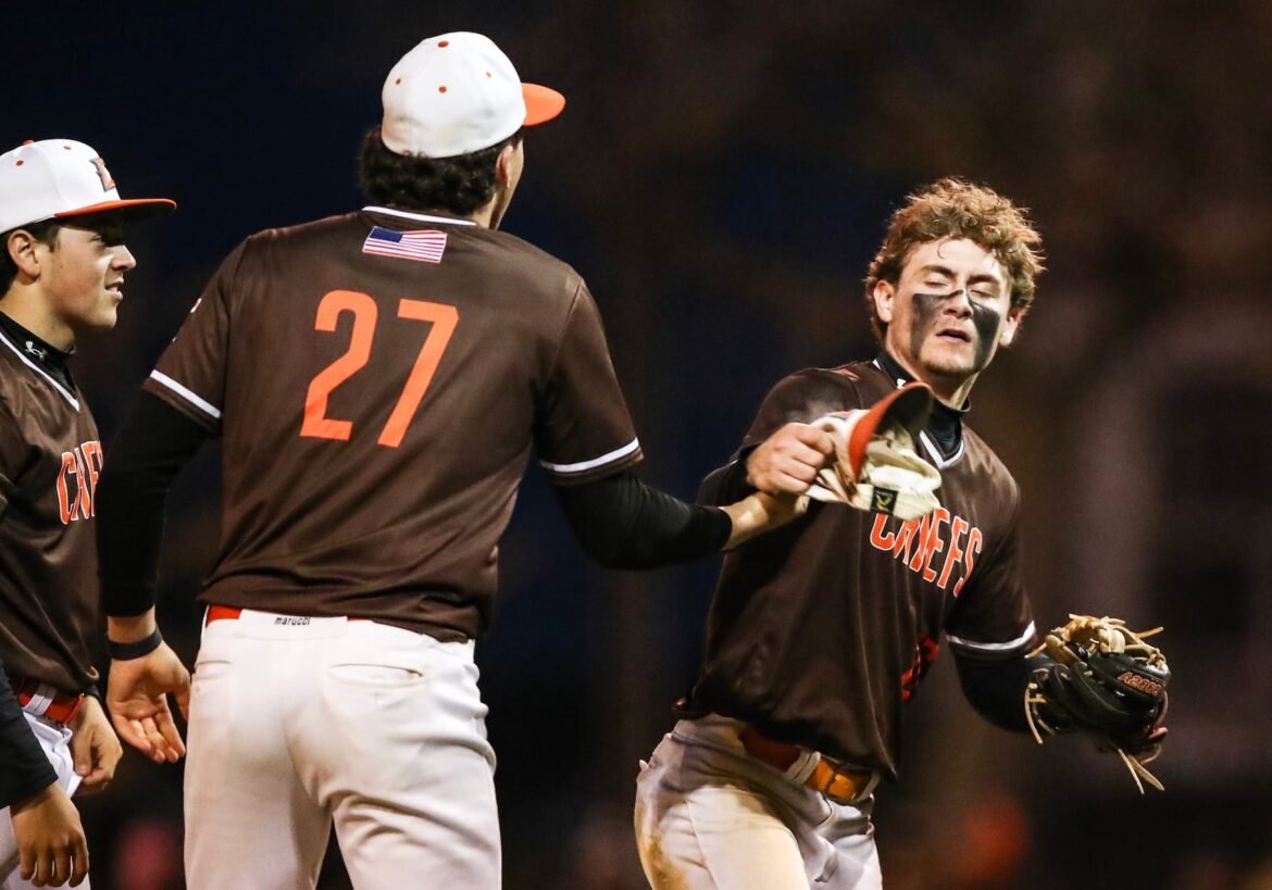 Brett Jackson (26) of Cherokee and the Chiefs celebrate after their 5-4 win during the Downbeach Coaches Vs. Cancer baseball game between Jackson Township and Cherokee Jerome Avenue Fields in Margate City, NJ on 4/24/26.