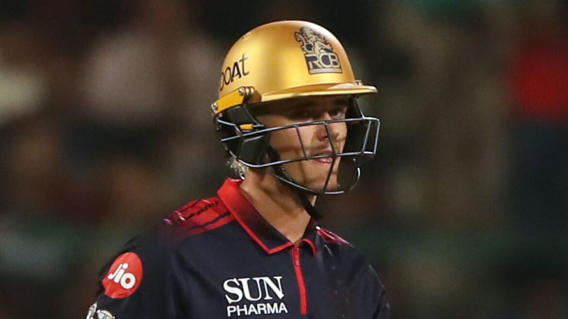 Royal Challengers Bengaluru's Jacob Bethell leaves the ground after losing his wicket during the Indian Premier League cricket match between Royal Challengers Bengaluru and Gujarat Titans in Bengaluru, India, Friday, April 24, 2026. (AP Photo)