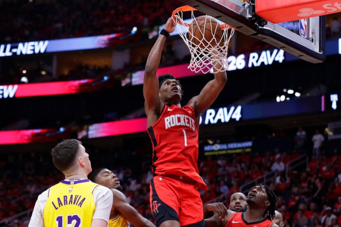 Houston Rockets guard Amen Thompson (1) dunks against the Los Angeles Lakers during the second half of Game 3 in a first-round NBA playoffs basketball series Friday April 24, 2026, in Houston. (AP Photo/Michael Wyke)