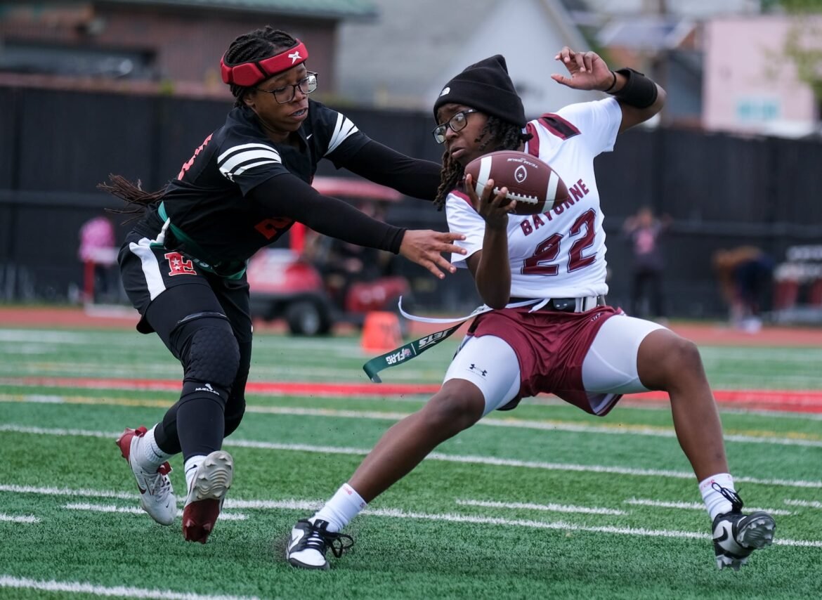 Bayonne’s Taleiyah Smith (22) evades an Elizabeth player on Wednesday, April 22, 2026.