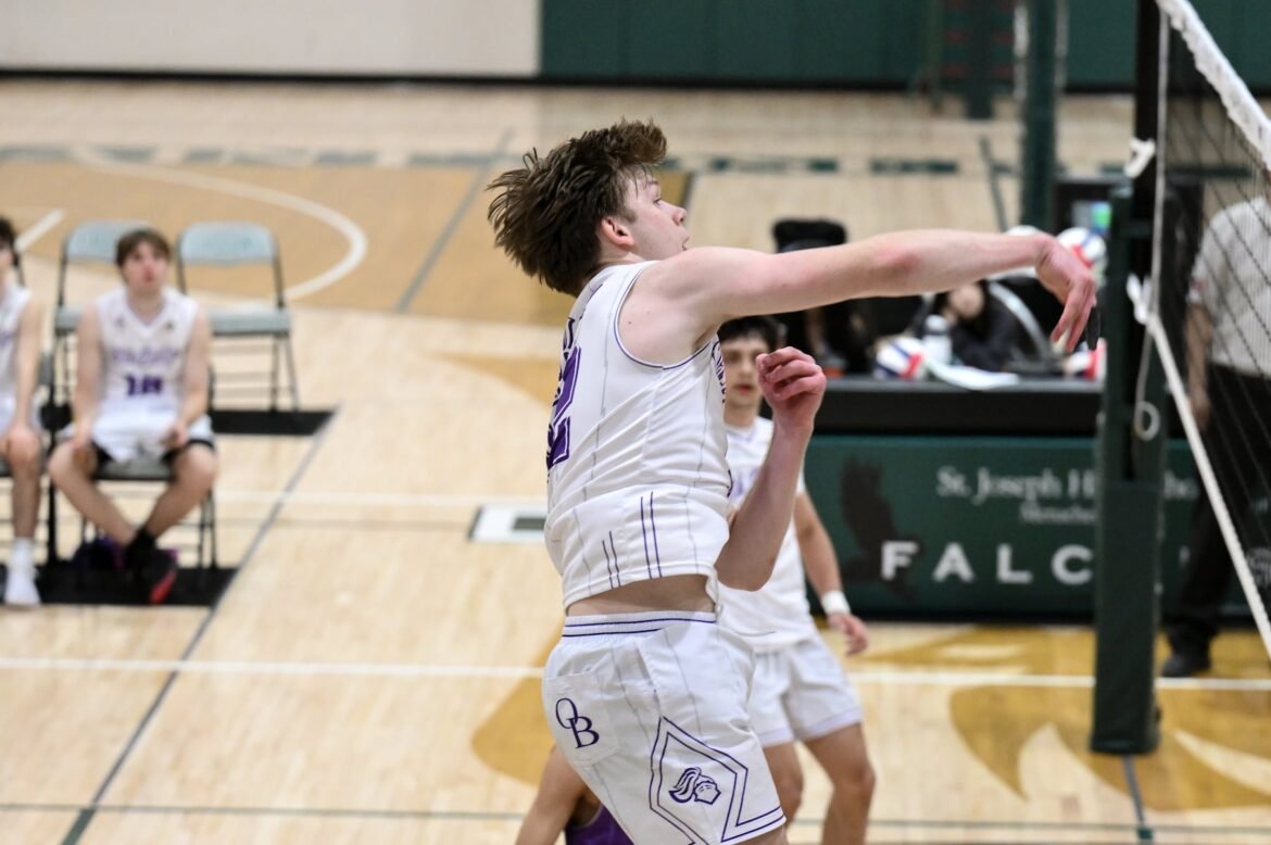 Oskar Lapinski (12) of Old Bridge hits a kill shot during the boys volleyball match between St. Joseph (Metuchen) and Old Bridge at St. Joseph High School in Metuchen, NJ on Tuesday. April 14, 2026