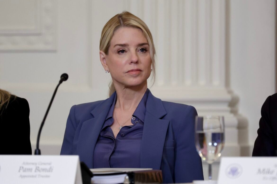 Attorney General Pam Bondi listens as President Donald Trump speaks during a lunch with the Kennedy Center board members in the East Room of the White House on March 16, 2026, in Washington, D.C. (Photo by Alex Wong/Getty Images)