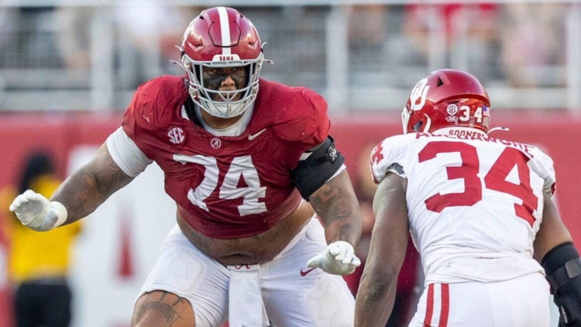 Alabama offensive lineman Kadyn Proctor (74) sets up to block against Oklahoma defensive lineman Adepoju Abebawore (34) during the first half of an NCAA college football game, Saturday, Nov. 15, 2025, in Tuscaloosa, Ala. (AP Photo/Vasha Hunt)