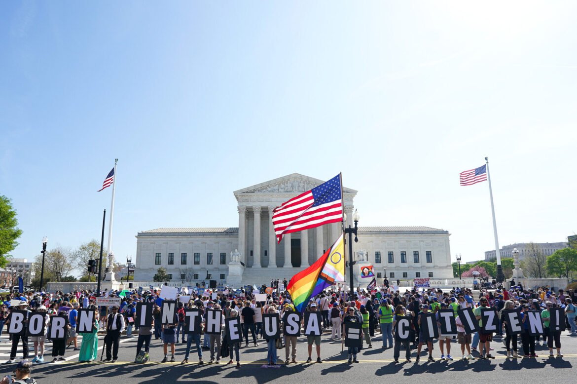 Protesters attend a rally on protecting birthright citizenship outside the U.S. Supreme Court as U.S. President Donald Trump attends oral arguments on April 01, 2026 in Washington, D.C. (Photo by Al Drago/Getty Images)