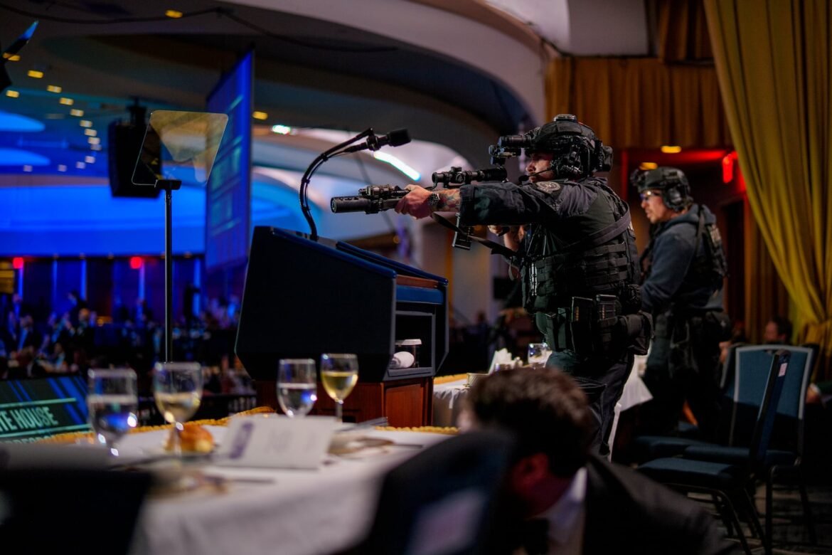 WASHINGTON, DC - APRIL 25: Armed Secret Service agents stand on stage during a shooting incident at the annual White House Correspondents Association Dinner at the Washington Hilton on April 25, 2026 in Washington, DC. According to reports, President Donald Trump, along with other government officials, were evacuated from the Washington Hilton gun shots. (Photo by Andrew Harnik/Getty Images)