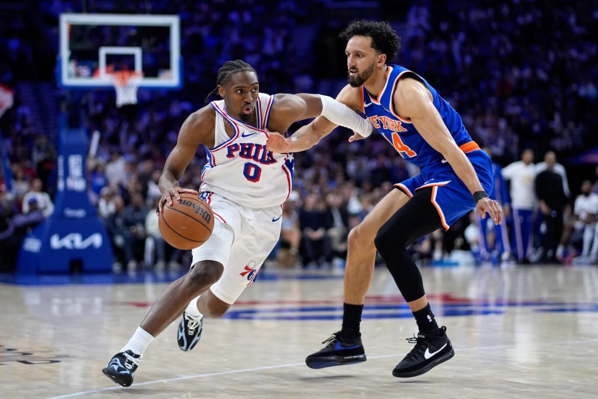 Philadelphia 76ers' Tyrese Maxey, left, tries to get past New York Knicks' Landry Shamet during the second half of Game 3 in a second-round NBA basketball playoff series Friday, May 8, 2026, in Philadelphia. (AP Photo/Matt Slocum)