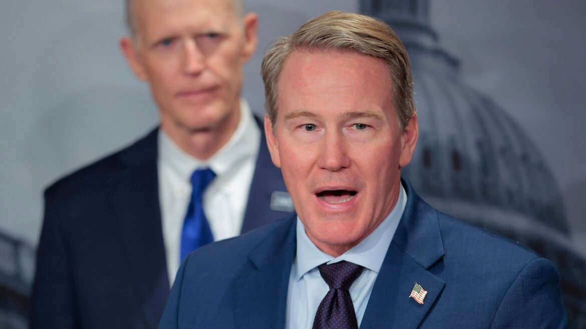 Sen. Jon Husted (R-OH) speaks to reporters during a news conference.