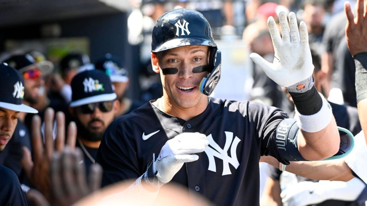 Aaron Judge's cleats feature logo of his dogs, Penny and Gus